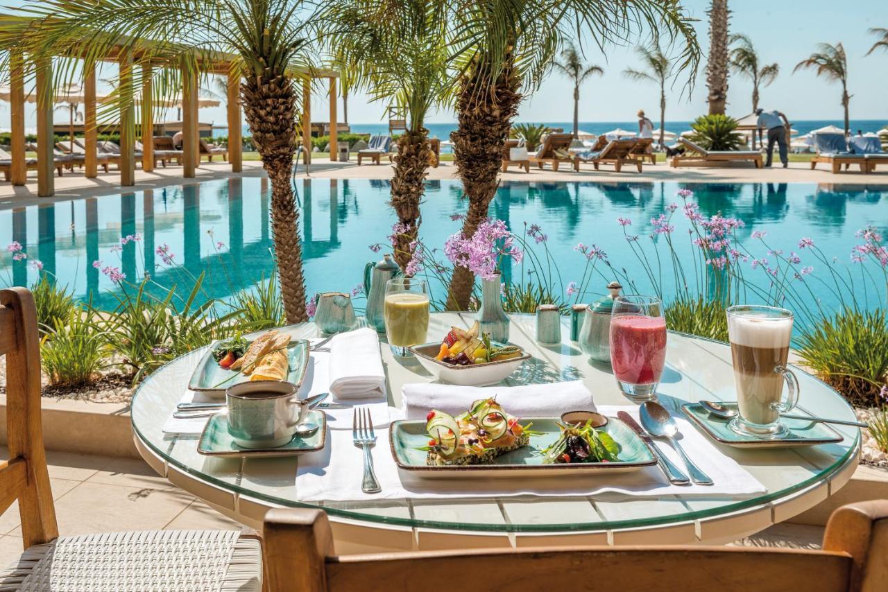 Mitsis Selection Alila Faliraki Exterior foto Poolside dining at the Four Seasons Hotel, Tel Aviv
